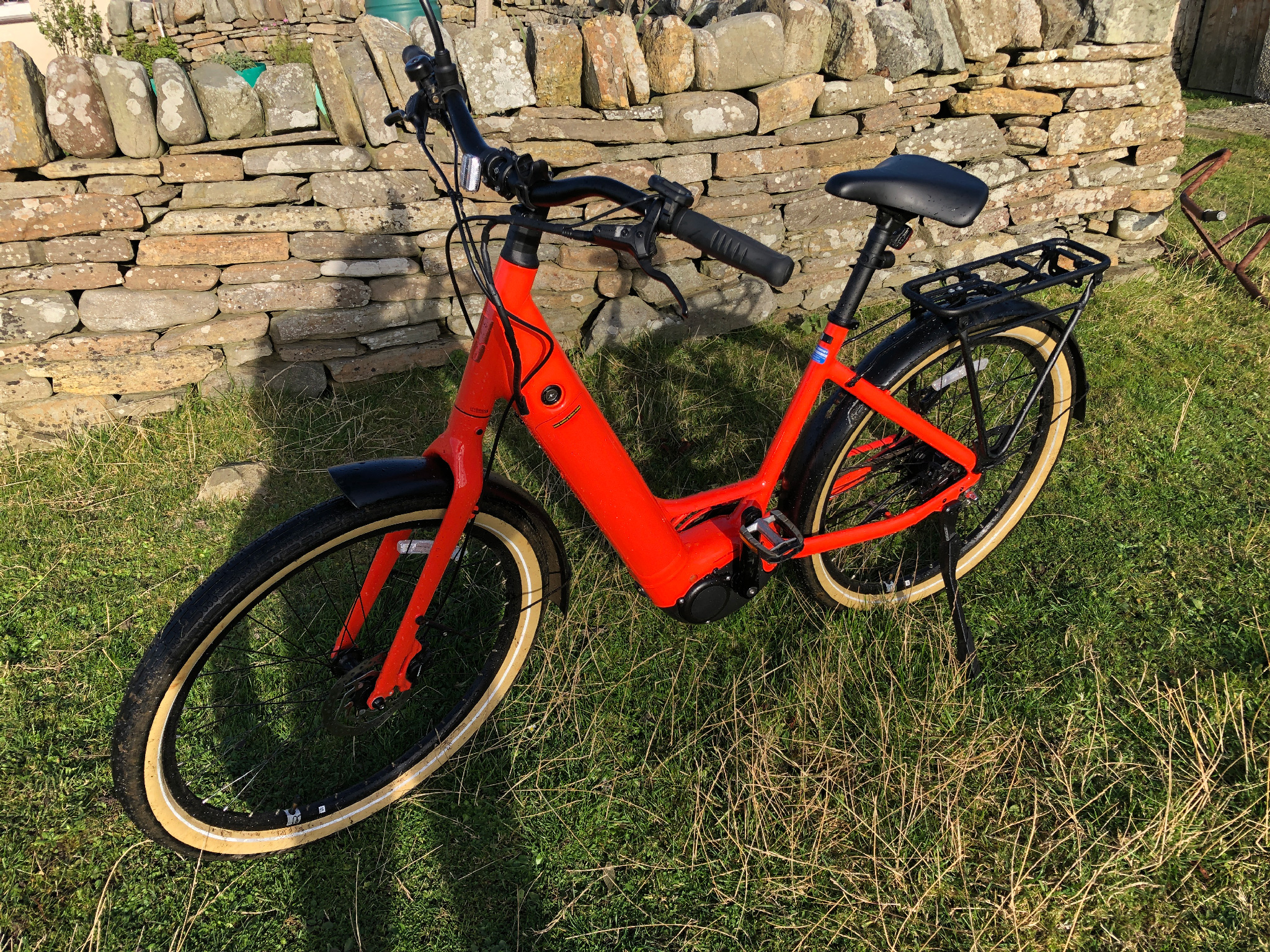 An orange e-bike